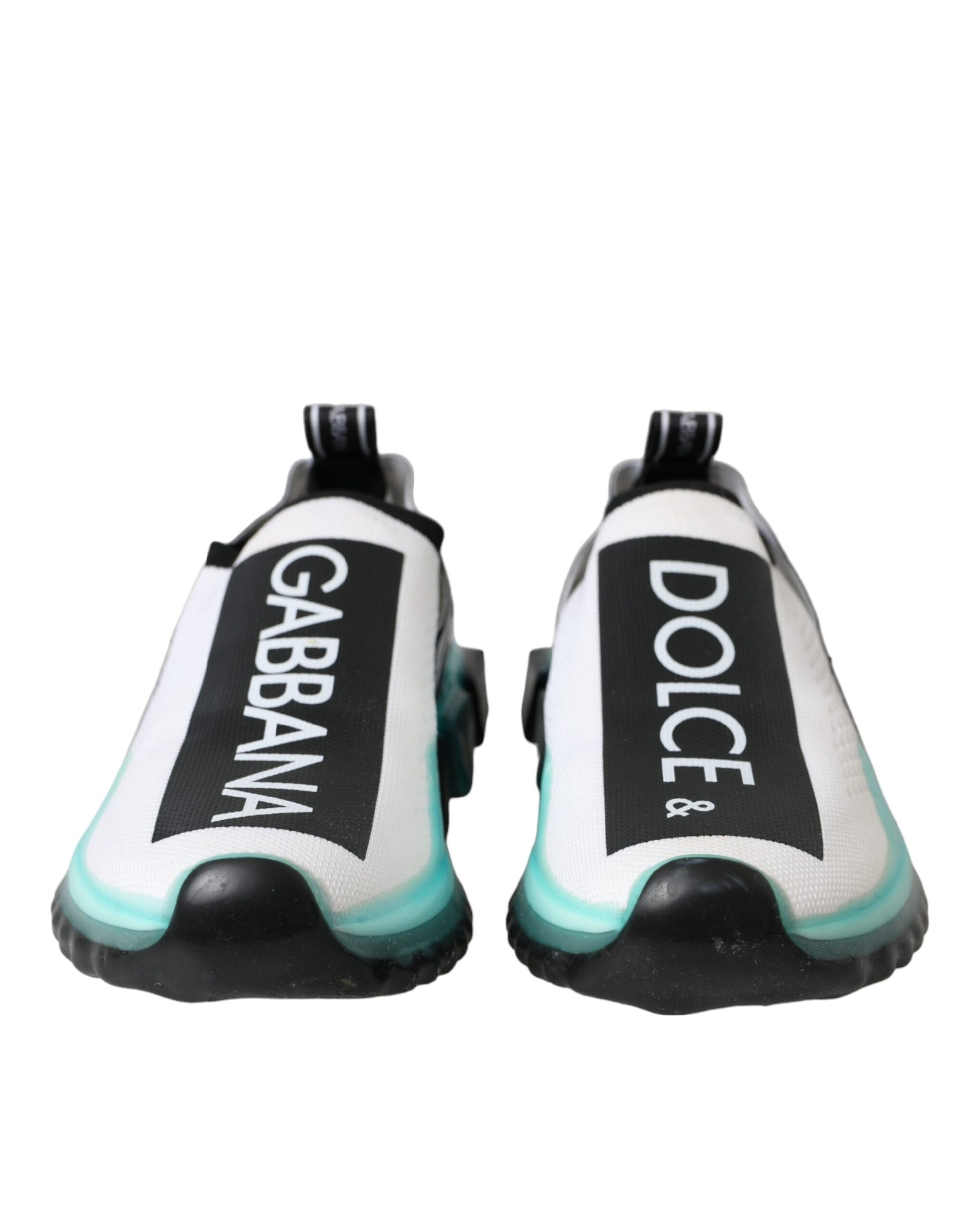 Dolce & Gabbana Sorrento slip-on sneakers in white stretch mesh with black logo panels and bright blue accents.
