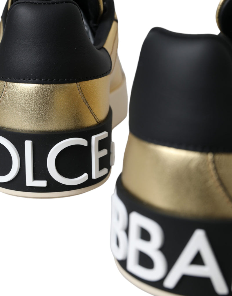 Metallic gold calf leather sneakers with black heel counters and white raised Dolce & Gabbana logos on the heels.