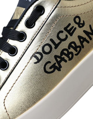 Metallic gold calf leather sneaker with black laces and bold, black Dolce & Gabbana logo print on the side.