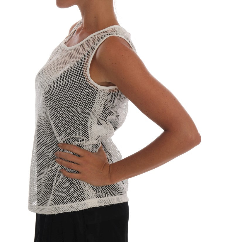 White net tank top worn over black layer