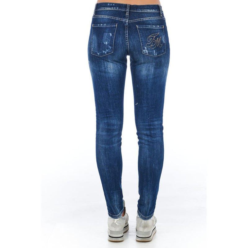 Blue cotton skinny women jeans with distressed finish and back pockets