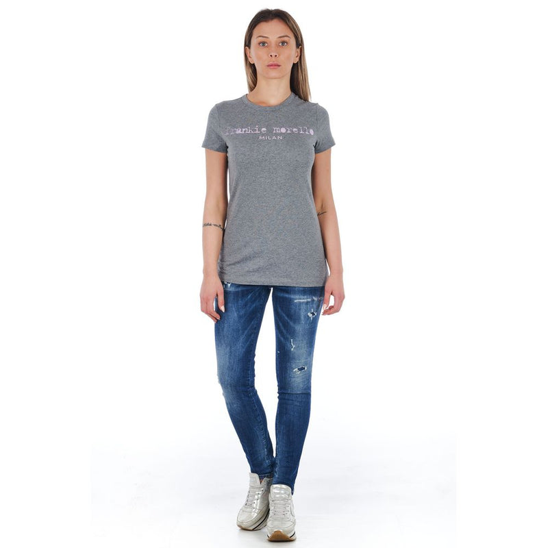 Blue cotton skinny women jeans with distressed details worn by a model