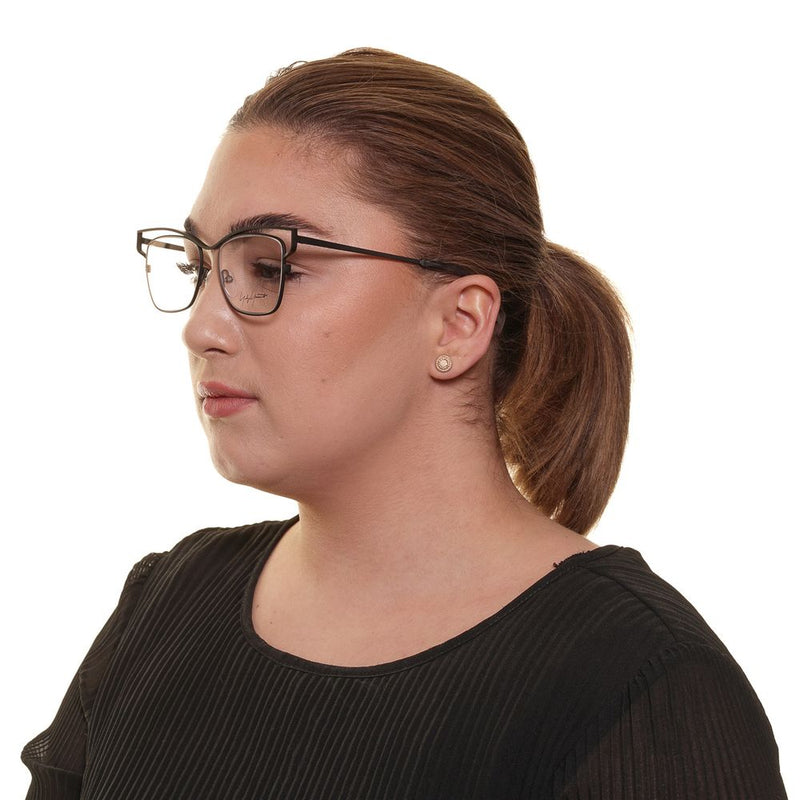 Yohji Yamamoto gray titanium cat-eye glasses frames worn by a woman