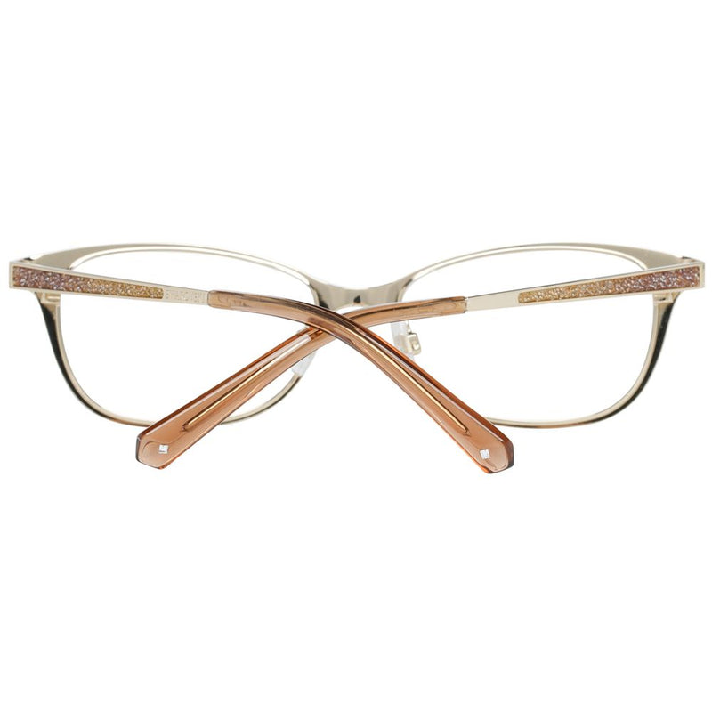 Gold metal cat-eye eyeglass frames with sparkly crystal-embellished temples and brown tips