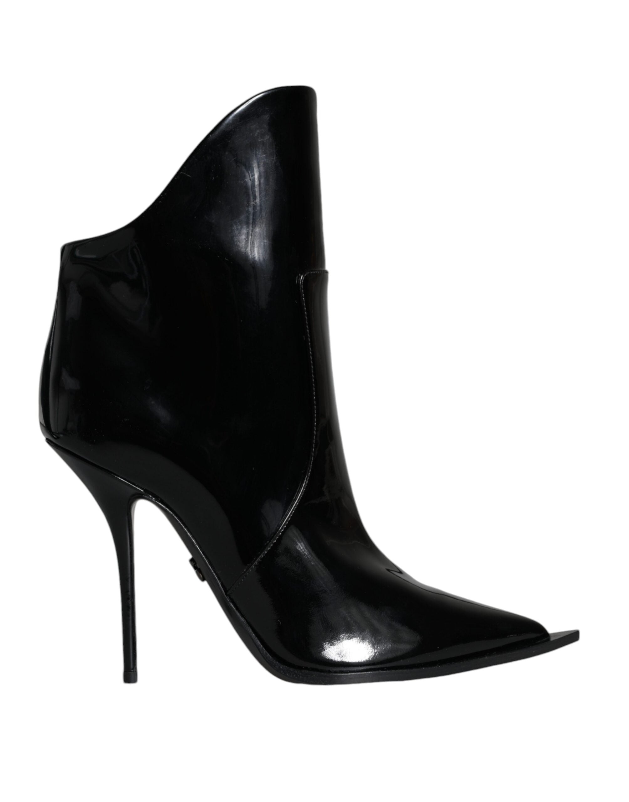 Dolce & Gabbana black patent leather ankle boots with a high-cut shaft, stiletto heel, and sharp pointed toe.