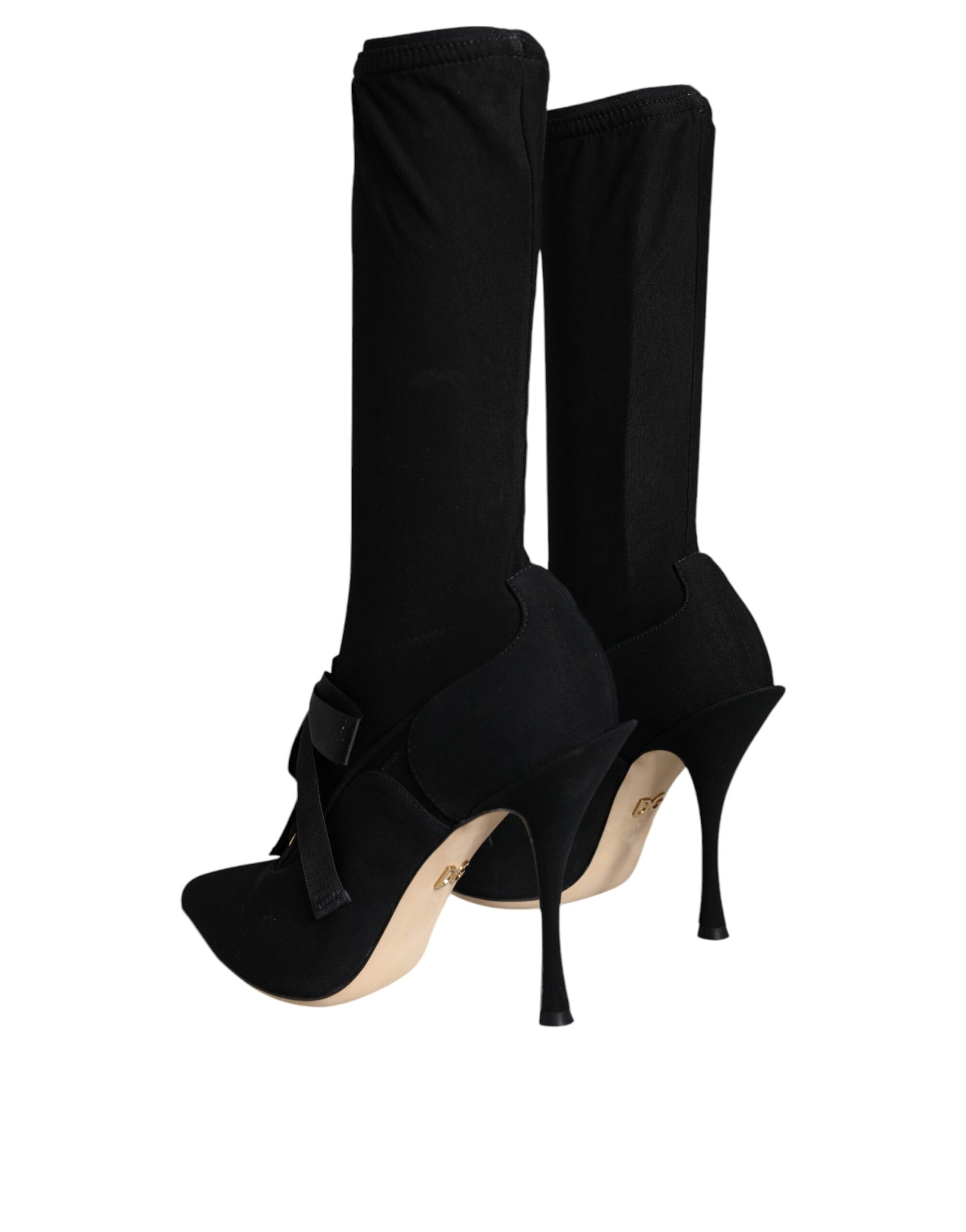 Dolce & Gabbana black mid-calf stiletto boots in stretch fabric with a pointed toe and slim heel.