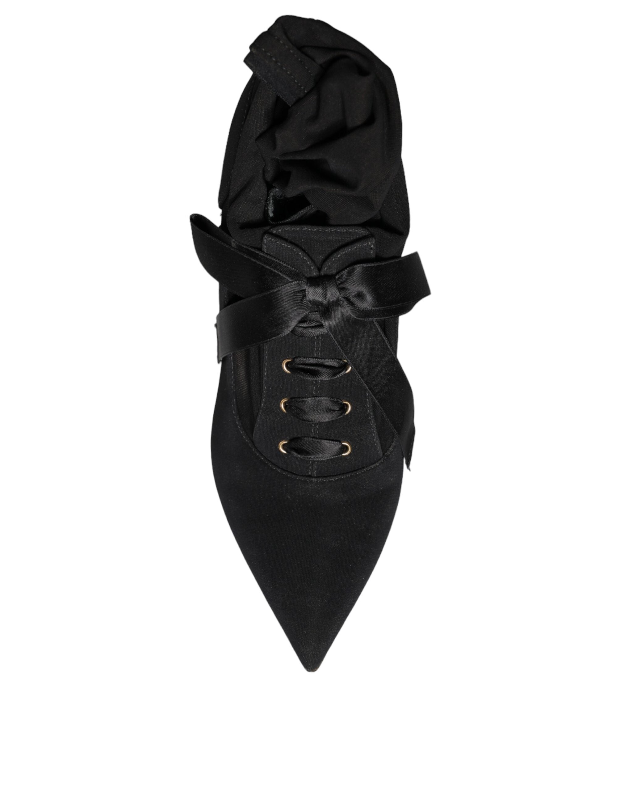 Black suede mid-calf boots with a pointed toe, lace-up front with silk ribbon, and a stiletto heel.
