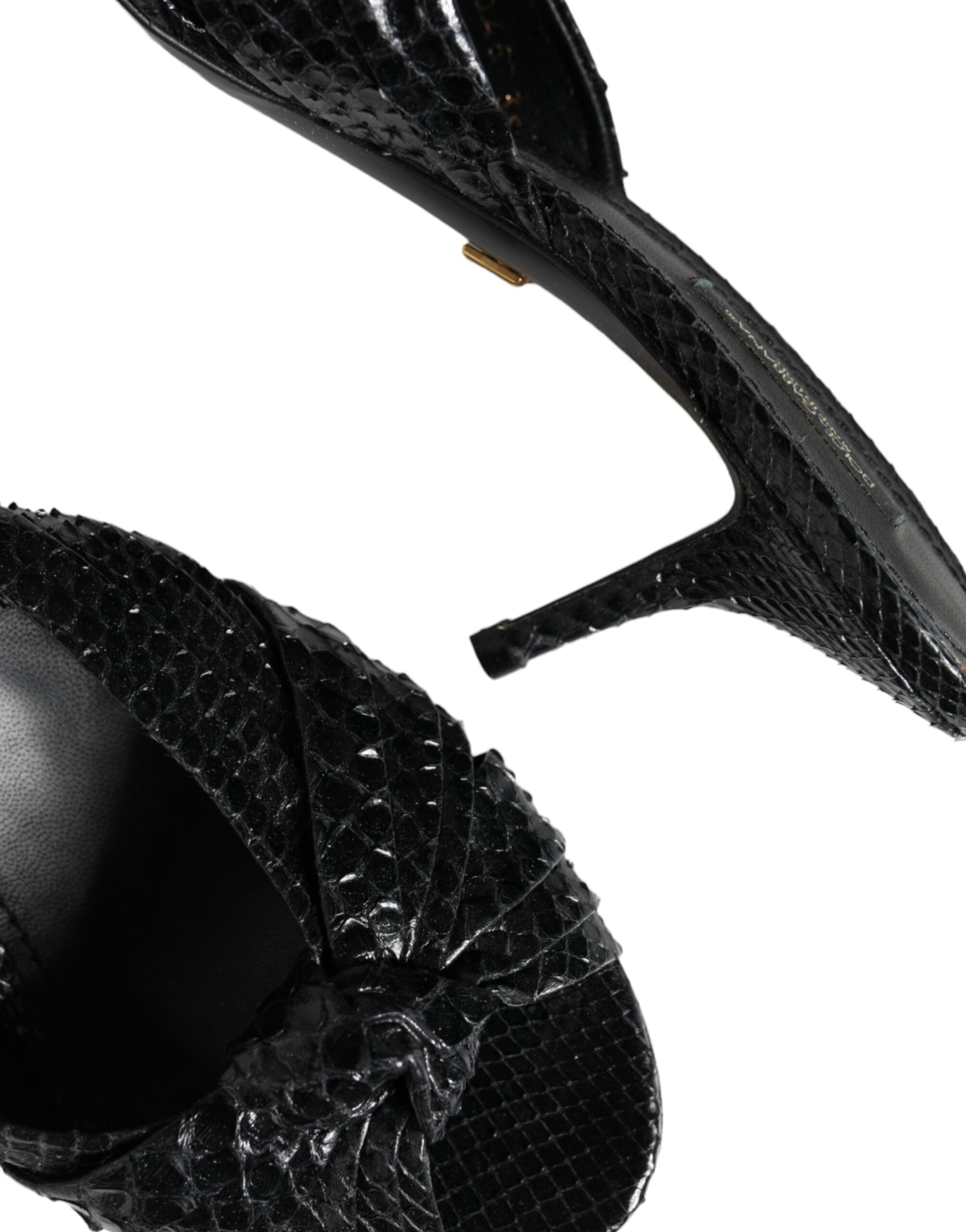 Dolce & Gabbana black snakeskin-textured leather slide sandals with a knot detail and a kitten heel.