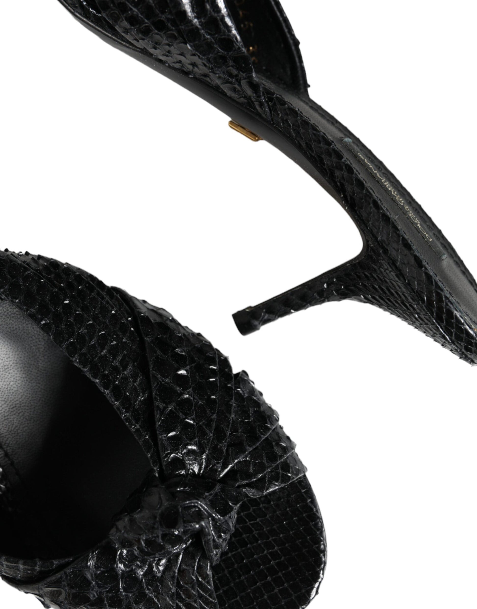 Dolce & Gabbana black snakeskin-textured leather slide sandals with a knot detail and a kitten heel.