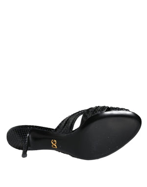 Dolce & Gabbana black snakeskin-embossed leather kitten heel slide sandal with a gold DG logo on the sole.
