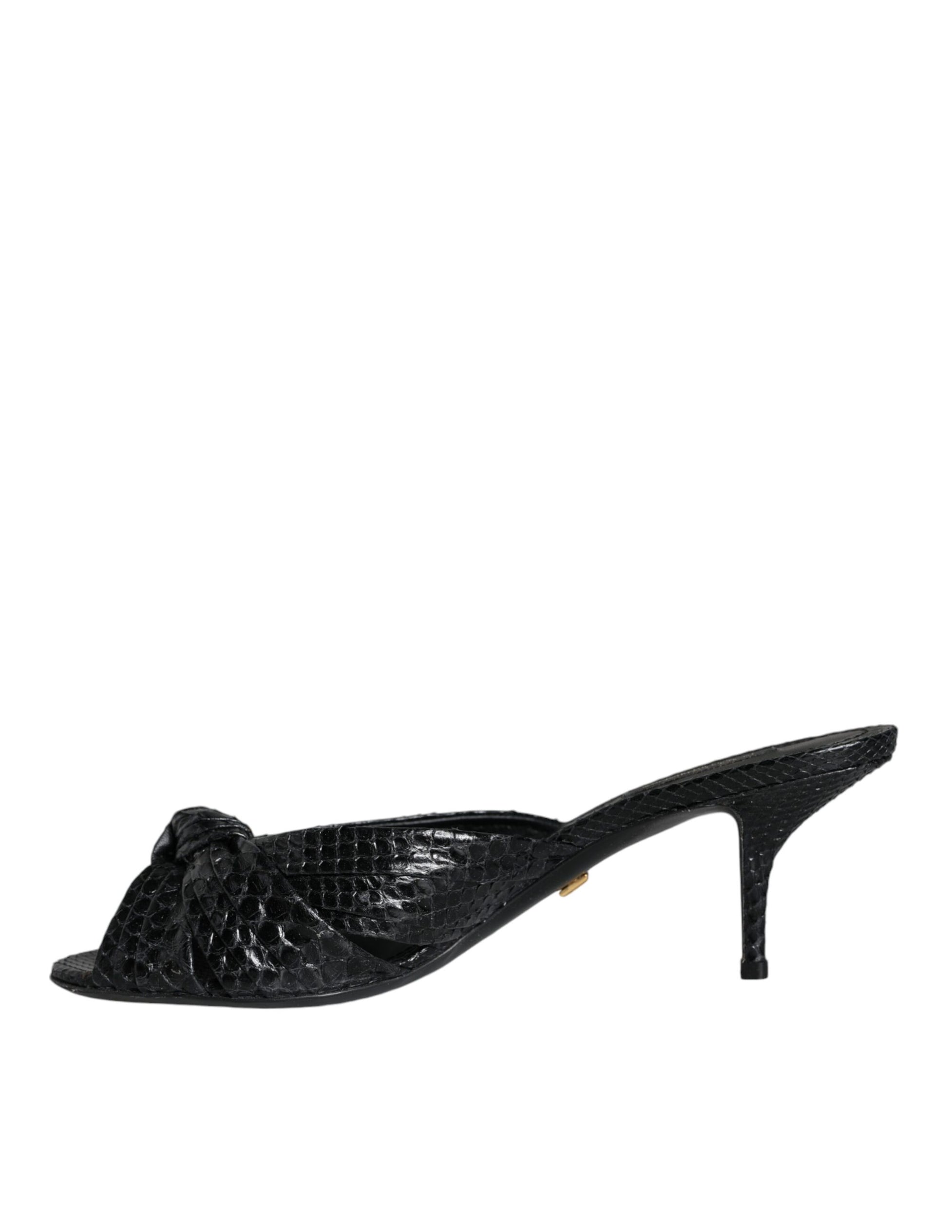 Dolce & Gabbana black embossed leather mule sandals with a knotted front detail and a sleek kitten heel.