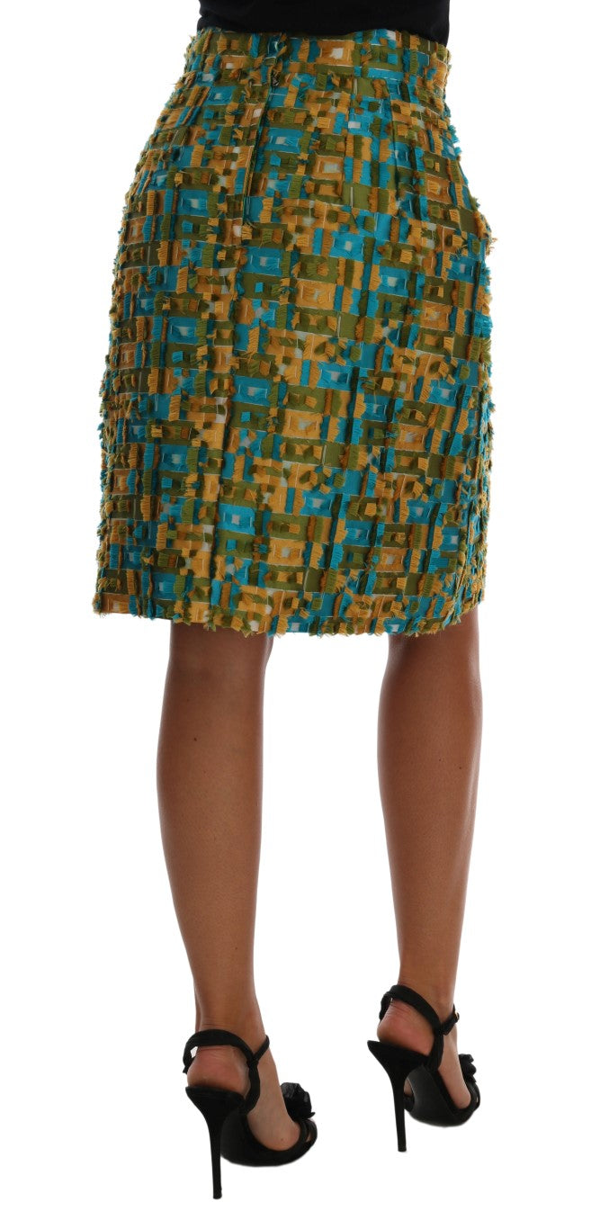 Multicolor jacquard straight pencil skirt with a textured pattern in blue, gold, and green shades