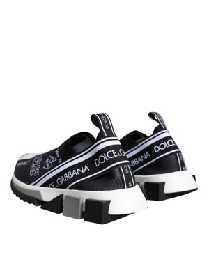 Dolce & Gabbana black and white slip-on sneakers in stretch knit with logo branding and geometric rubber soles.