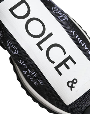 Black and white stretch knit Dolce & Gabbana Sorrento slip-on sneaker with graffiti-style text and heart graphics.