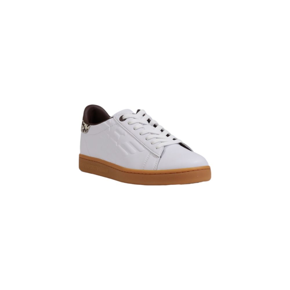 White sneaker with brown sole on a white background
