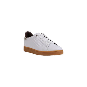 White sneaker with brown sole on a white background