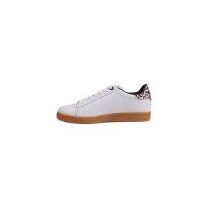 White sneaker with a brown sole on a white background