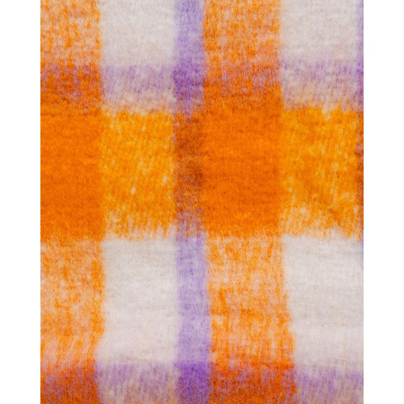 Fuzzy orange, purple, and white plaid polyester scarf fabric texture