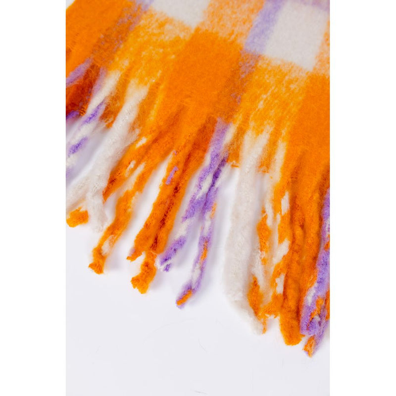 Fuzzy orange and purple plaid polyester scarf with fringed ends