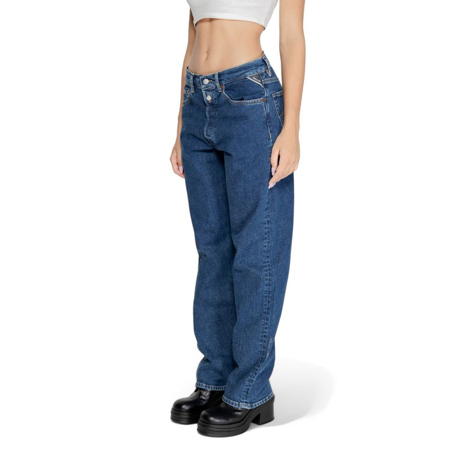 Blue cotton mom jeans worn by a model with a white top