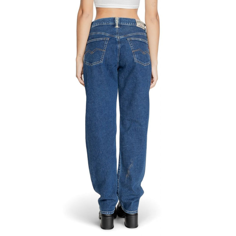 Blue cotton mom jeans worn from the back