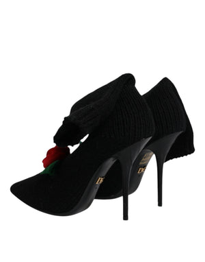 Dolce & Gabbana black knit mid-calf stiletto boots featuring a red fabric rose detail and gold hardware.