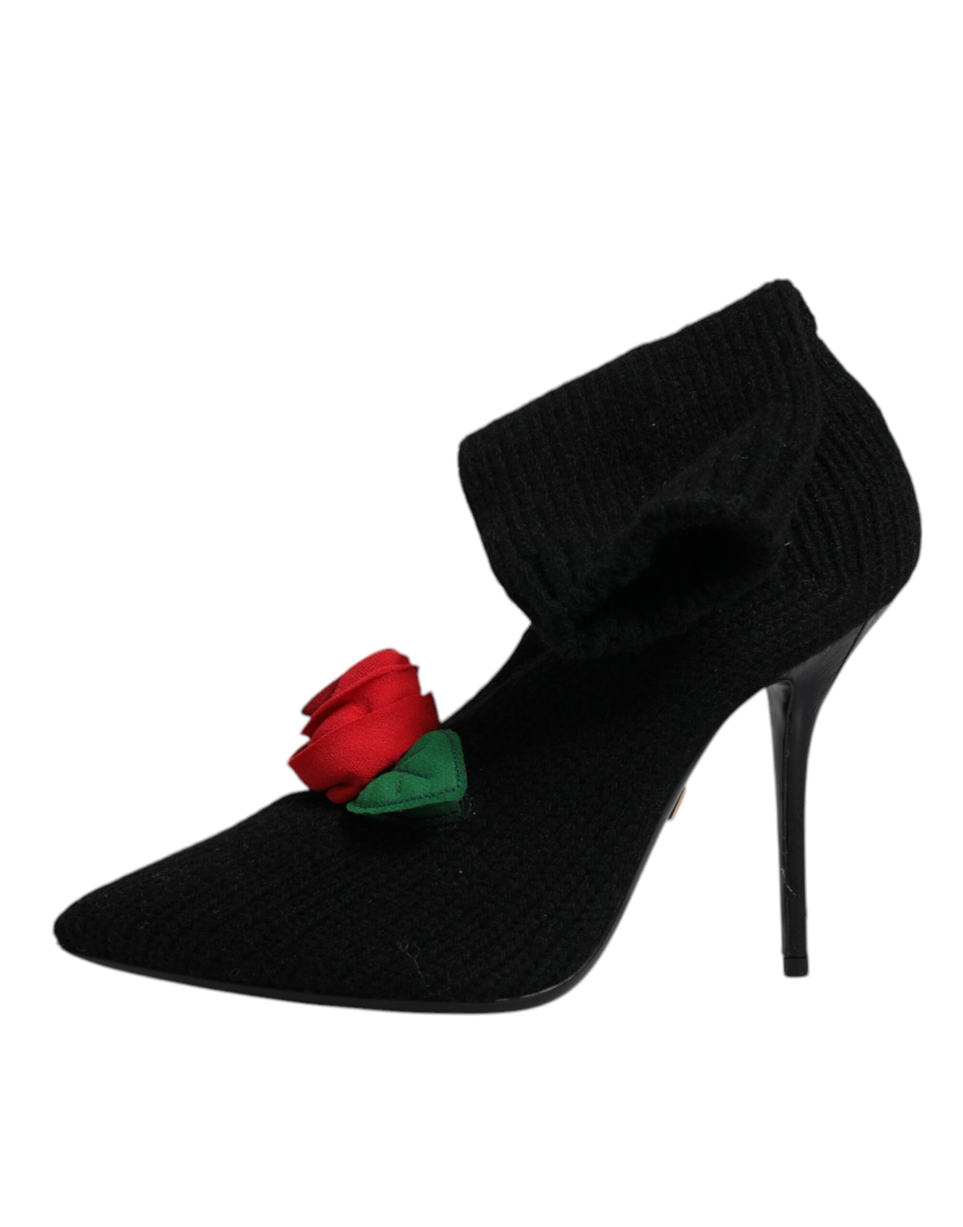 Black ribbed knit mid-calf stiletto boot with pointed toe and a red fabric rose appliqué.