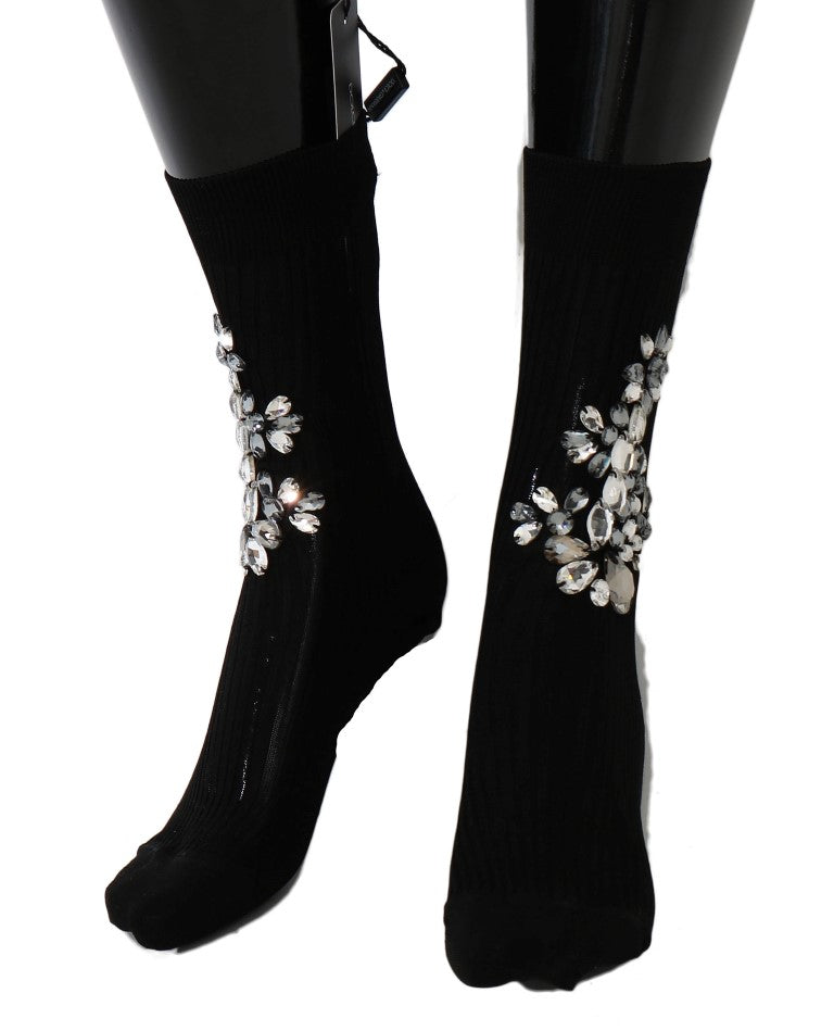 Black knitted socks adorned with sparkling clear crystal floral embellishments