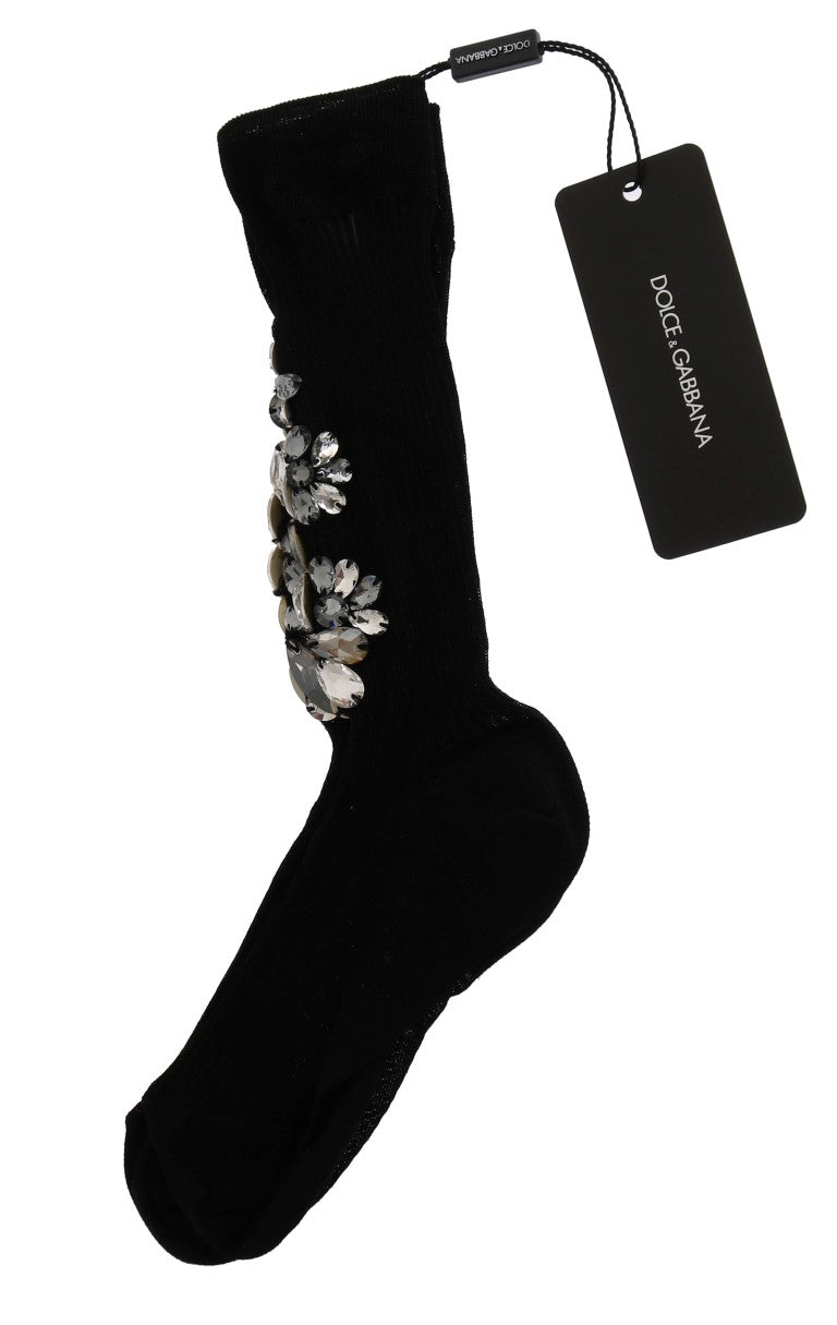 Black knitted knee-high sock adorned with clear crystal floral embellishments down the side