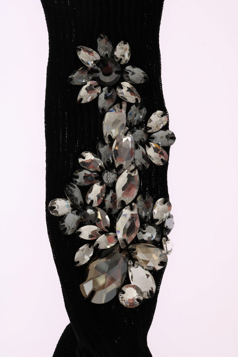 Black knit sock decorated with clear crystal floral embellishments