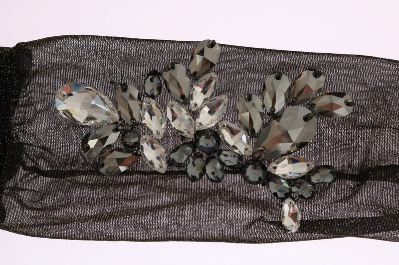Black stretch sheer sock embellished with a cluster of clear and grey faceted crystals forming a floral pattern