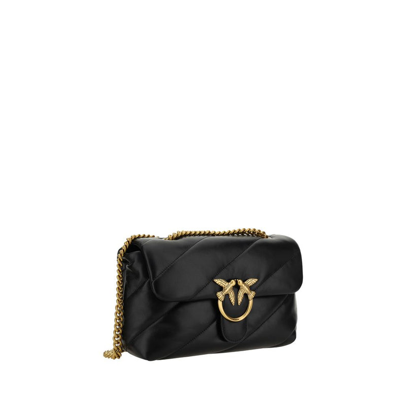 Black quilted leather shoulder bag with gold chain strap and metal bird clasp