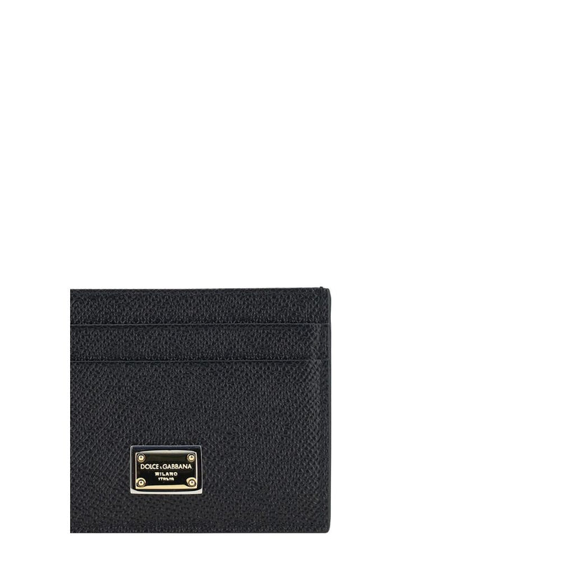 Black textured leather card holder wallet with a silver and black logo plaque