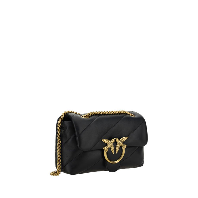 Black quilted leather shoulder bag with gold chain strap and clasp