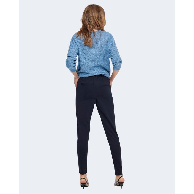 Blue viscose casual pants worn by a model from the back view
