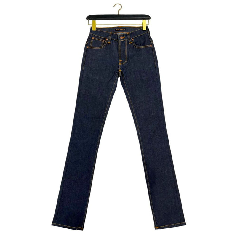 Dark blue cotton denim women's jeans with orange contrast stitching hanging on a black hanger