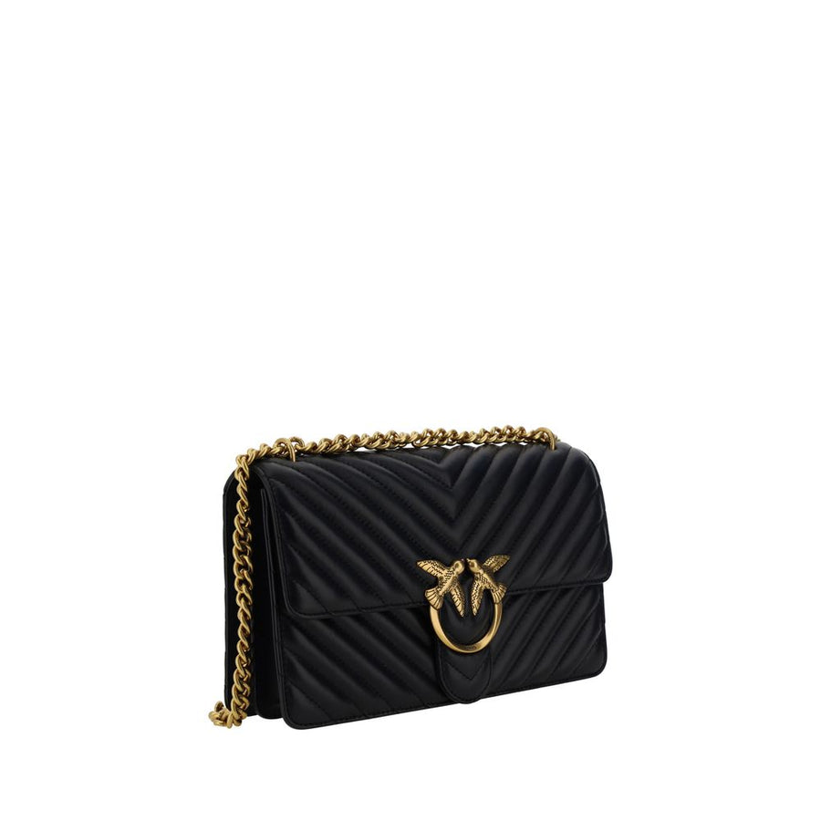 Black quilted leather shoulder bag with gold chain strap and interlocking bird clasp