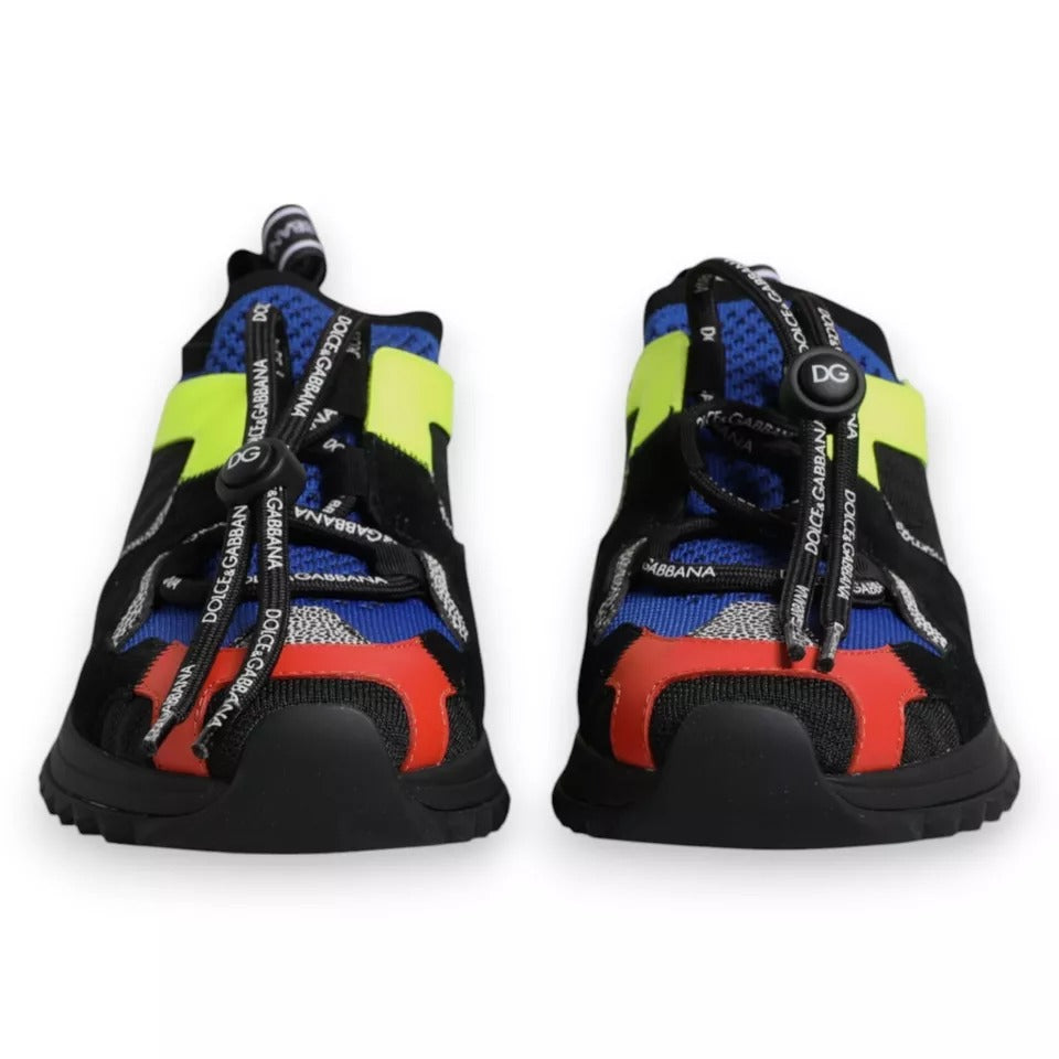 Dolce & Gabbana multicolor mesh and suede trekking sneakers with black soles, neon yellow accents, and toggle laces.