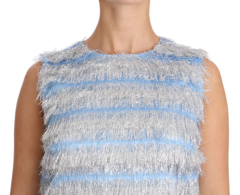 Light blue sleeveless shift dress covered in textured silver fringe tiers
