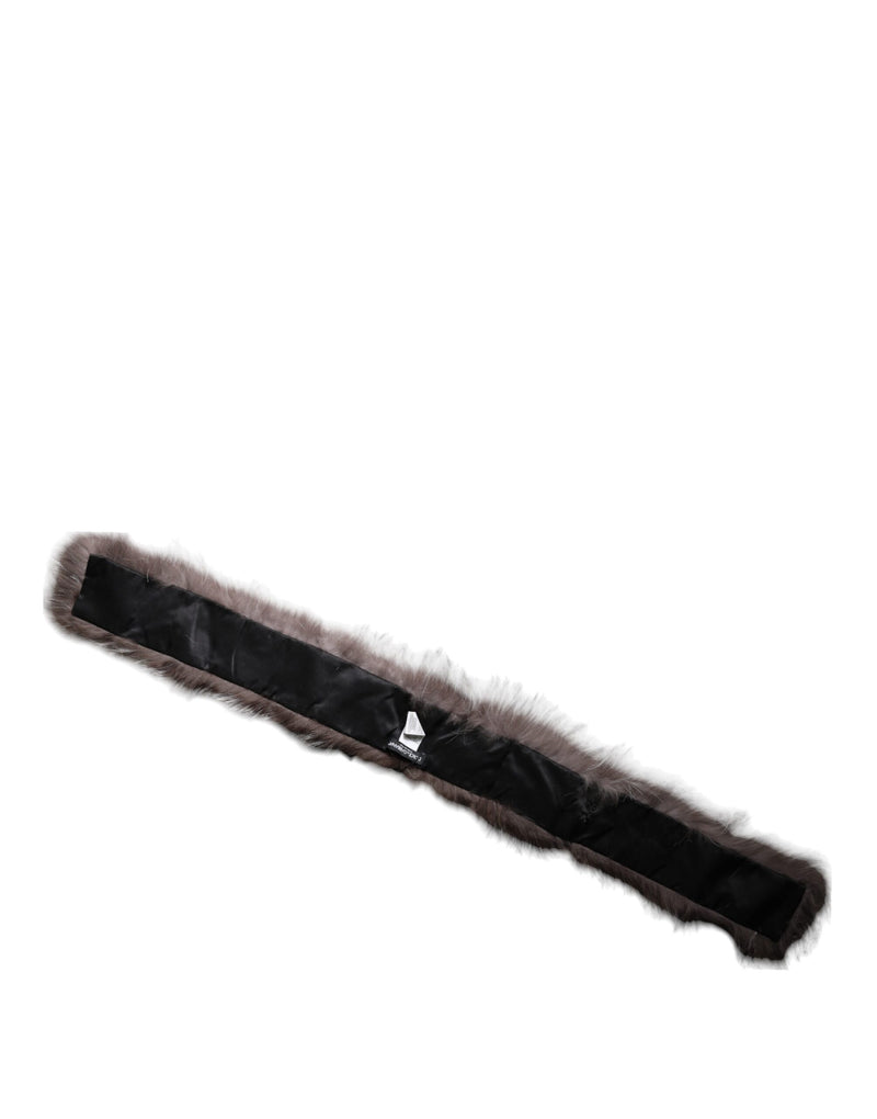 Gray fox fur neck wrap and winter scarf with a black lining laid flat