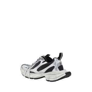 Balenciaga multicolor polyethylene athletic sneaker in silver, black, and white with a chunky, layered design.
