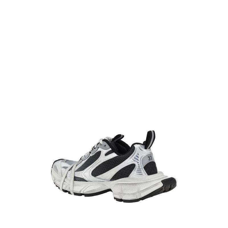 Balenciaga multicolor polyethylene athletic sneaker in silver, black, and white with a chunky, layered design.