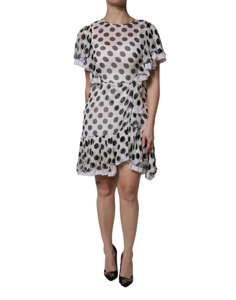 White silk blend A-line dress with black polka dots and ruffles