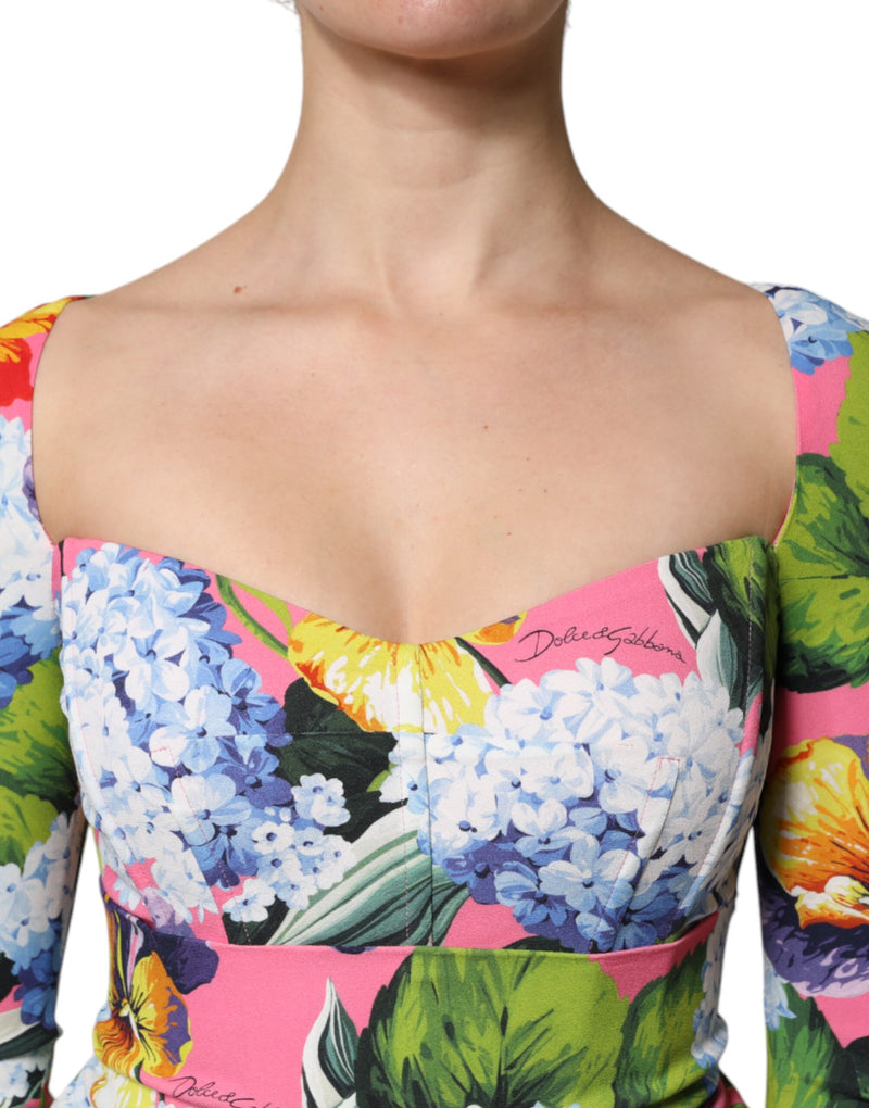 Pink floral print midi dress with a sweetheart neckline and long sleeves