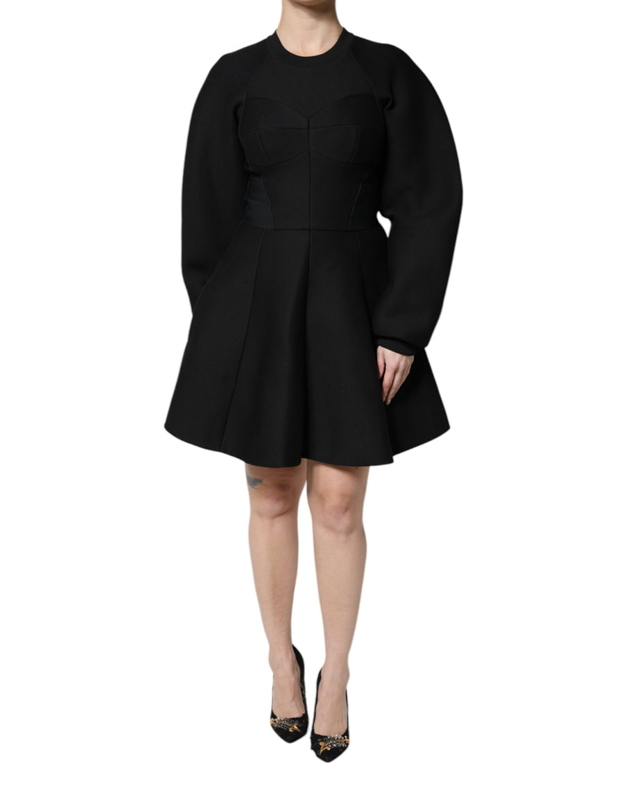Black long-sleeve cotton A-line mini dress with structured bodice