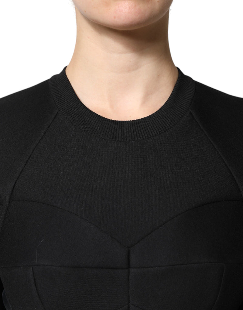 Black cotton mini dress with a ribbed crew neckline and paneled bodice