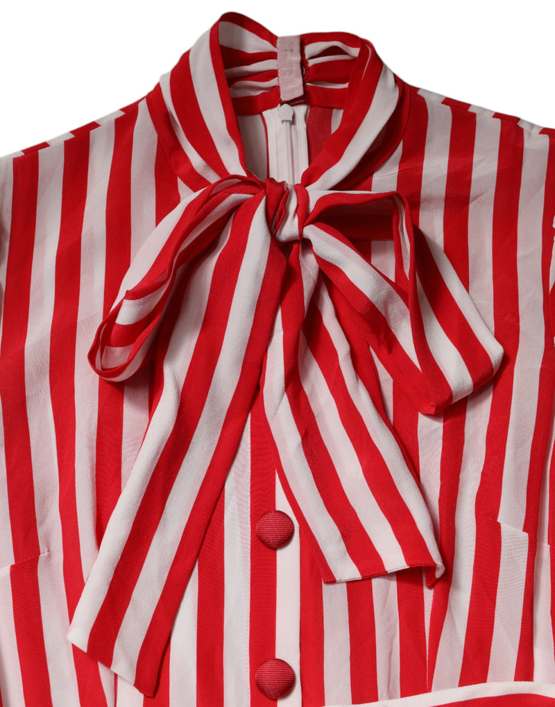 White and red striped silk dress featuring a high collar with a tied bow and front buttons