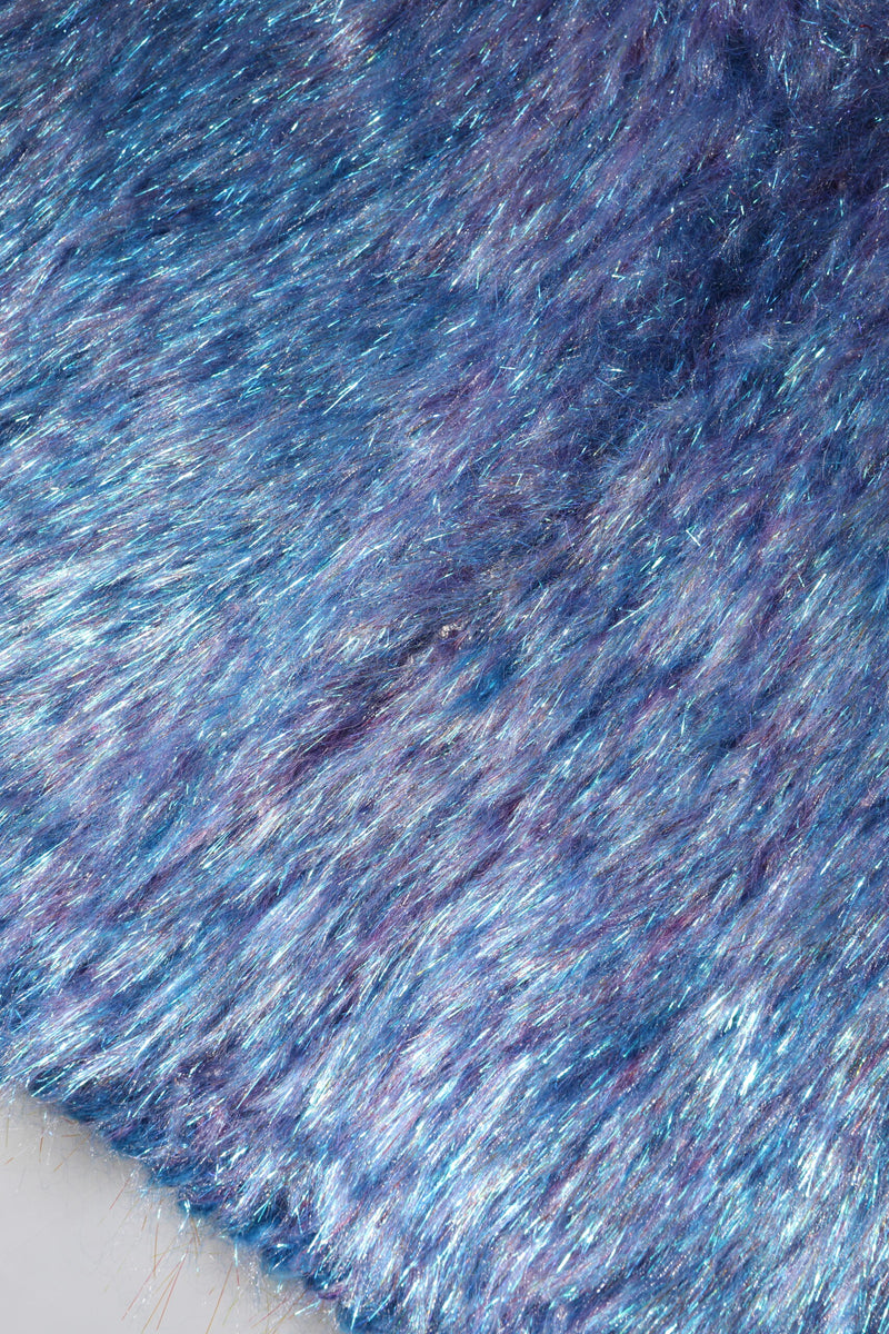 Multicolor plush faux fur texture with blue, purple, and shimmering silver fibers