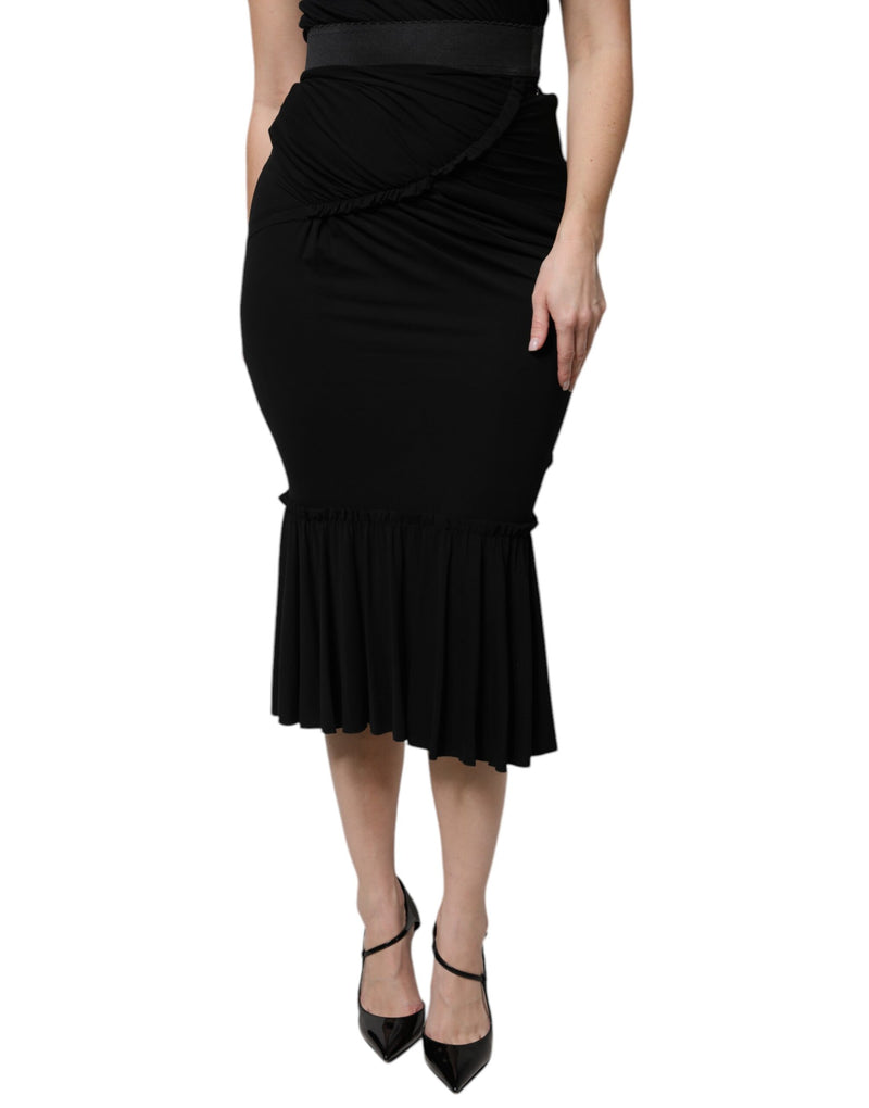 Black high-waist midi mermaid skirt with ruched detailing and a ruffled hem