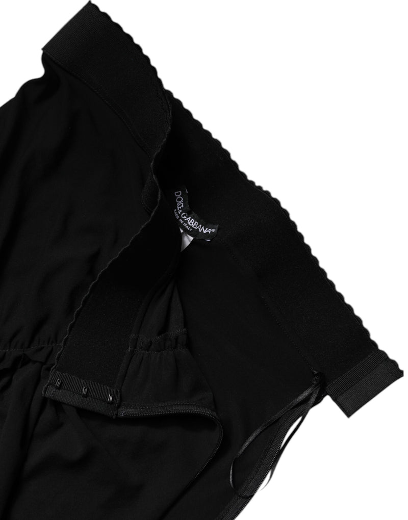 Black high waist midi skirt featuring an elastic waistband and Dolce & Gabbana brand label inside